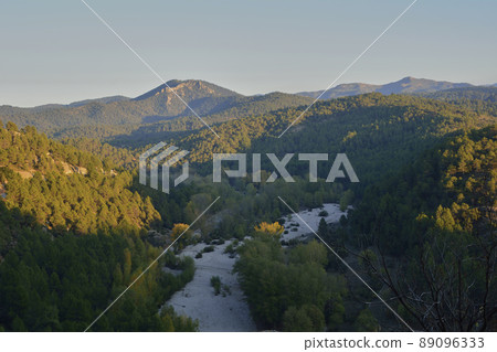 Narrow river between the green mountains 89096333