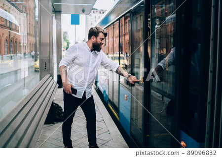 Young man going in modern bus 89096832
