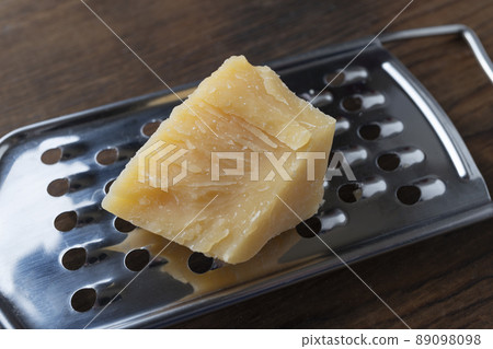 Close-up of a piece of parmesan Close-up of a piece of parmesan 89098098
