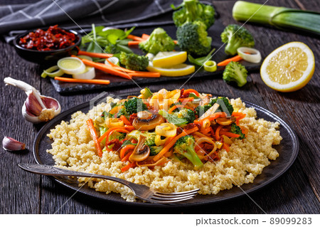 quinoa with fried veggies, mushrooms on plate quinoa with fried veggies, mushrooms on plate 89099283