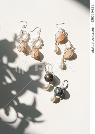 Top view flat lay hand-made earrings  89099488
