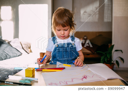 Small child at home at the children's table - Stock Photo [89099947] -  PIXTA