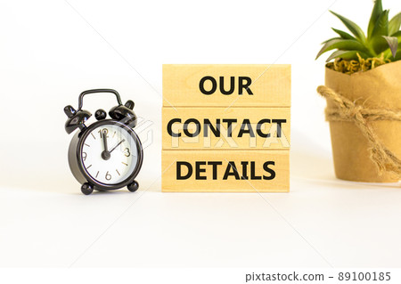 Our contact details symbol. Concept words Our contact details on wooden blocks. Beautiful white background. Black alarm clock. Business our contact details concept. Copy space. Our contact details symbol. Concept words Our contact details on wooden blocks. Beautiful white background. Black alarm clock. Business our contact details concept. Copy space. 89100185