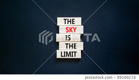 Sky is limit symbol. Concept words The sky is the limit on wooden blocks. Beautiful black table black background. Business motivational stress spice of life concept. Copy space. Sky is limit symbol. Concept words The sky is the limit on wooden blocks. Beautiful black table black background. Business motivational stress spice of life concept. Copy space. 89100218