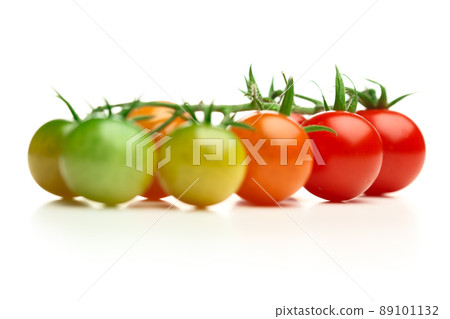 ripe and unripe cherry tomatoes isolated on white ripe and unripe cherry tomatoes isolated on white 89101132