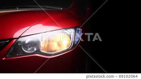 detail of a red sportcar detail of a red sportcar 89102064