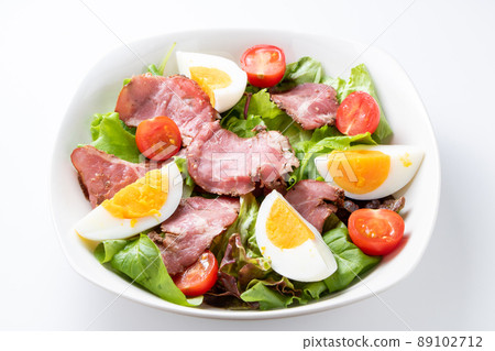 Pastrami (pastrami beef) salad. (White background) 89102712
