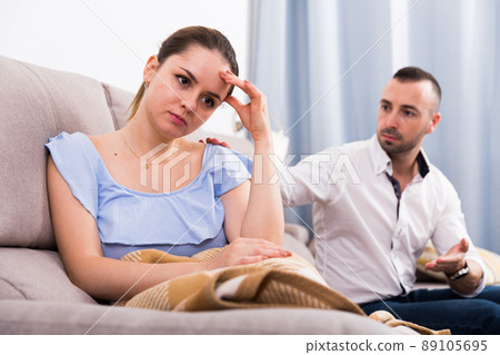 Woman is sad because of the conflict with her husband Woman is sad because of the conflict with her husband 89105695