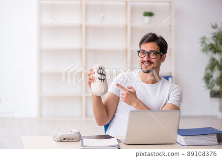Young male employee freelancer in remuneration concept 89108376