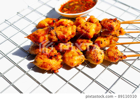 Chicken butt grilled on white background. Chicken butt grilled on white background. 89110310