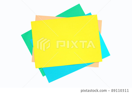 Colorful paper on white background. Copy space Colorful paper on white background. Copy space 89110311