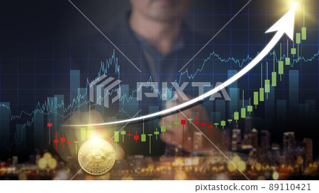 Hands of businessman with gold bitcoin coin. Volatile business graph on global network, Financial, Stock market, Cryptocurrency and investment. Stock market graph up. New Virtual money concept 89110421