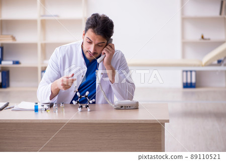 Young male doctor in vaccination concept Young male doctor in vaccination concept 89110521