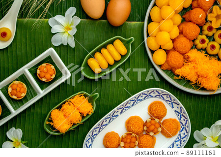 Thai traditional dessert concept, Assorted thai desserts served in a plate for auspicious day 89111161