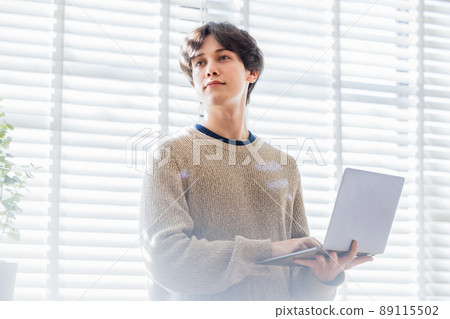 Young men personal computer 89115502