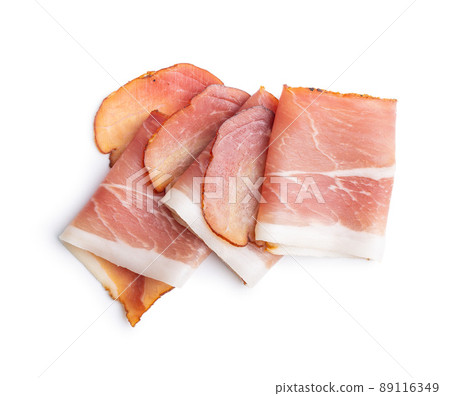 Sliced schwarzwald ham. Dried prosciutto ham isolated on white background. 89116349