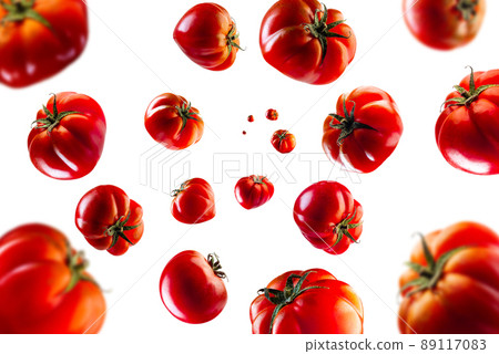 Collection of pachino tomato falling isolated on white background. Selective focus Collection of pachino tomato falling isolated on white background. Selective focus 89117083