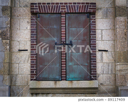 Iron window of stone warehouse Iron window of stone warehouse 89117409