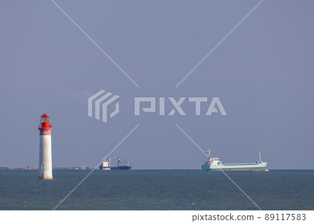 Phare de Chauvea near Ile de Re with ships to La Rochelle, Pays de la Loire, France Phare de Chauvea near Ile de Re with ships to La Rochelle, Pays de la Loire, France 89117583