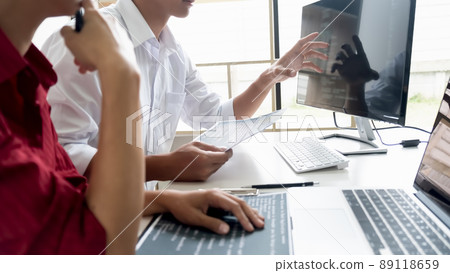 Programmer working in a software development and coding technologies. Website design. Technology concept. Programmer working in a software development and coding technologies. Website design. Technology concept. 89118659