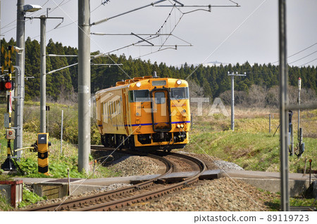 Photographing the scenery of a regular train of the South Hokkaido Railway in Hokuto City, Hokkaido in the spring 89119723