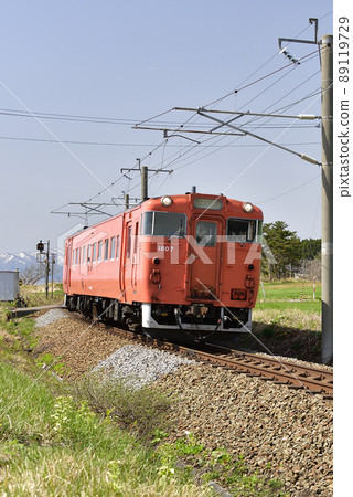 Photographing the scenery of a regular train of the South Hokkaido Railway in Hokuto City, Hokkaido in the spring 89119729