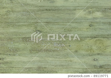 Old wooden worn fence boards weathered texture in peeling green paint dirty obsolete background Old wooden worn fence boards weathered texture in peeling green paint dirty obsolete background 89119771