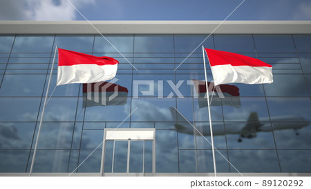 Landing airliner and flags of Indonesia in the airport terminal. 3D rendering 89120292