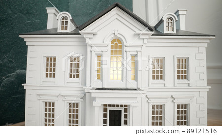 The house model is painted white under a tiled roof. House model. The house model is painted white under a tiled roof. House model. 89121516