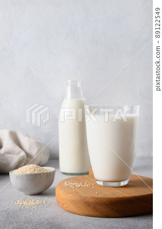 Sesame plant based milk on gray background. Close up. Vegan non dairy alternative milk. 89122549