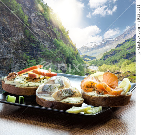 Typical Scandinavian sandwiches against deep walley close the train journey Flamsbana between Flam and Myrdal in Aurland in Western Norway Typical Scandinavian sandwiches against deep walley close the train journey Flamsbana between Flam and Myrdal in Aurland in Western Norway 89123111