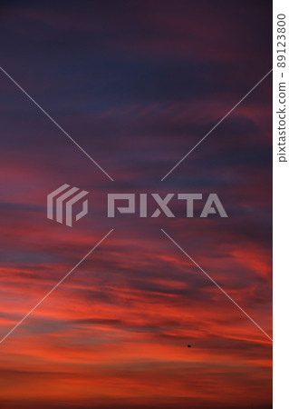 Vivid colourful clouds Dramatic Sky At Sunrise or Sunset. Orange red pink sky with beautiful clouds in sunlight background. Gradient cold to warm at sunset. Defocused abstract background Birds flying Vivid colourful clouds Dramatic Sky At Sunrise or Sunset. Orange red pink sky with beautiful clouds in sunlight background. Gradient cold to warm at sunset. Defocused abstract background Birds flying 89123800