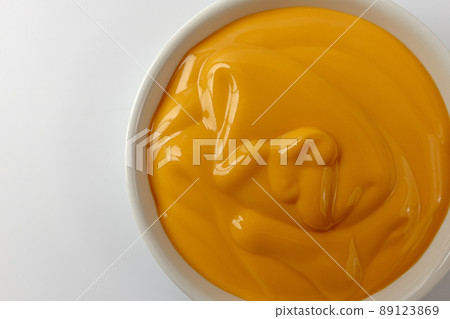Cheese sauce on white background 89123869
