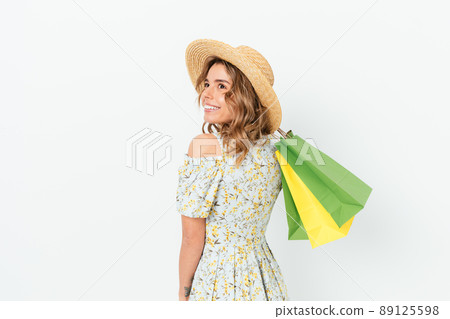 Happy fashionable young woman smiling 89125598