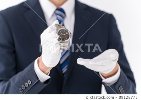 Pawn shop appraisal watch male hand 89128773