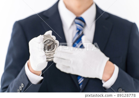 Pawn shop appraisal watch male hand 89128778