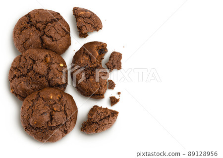 chocolate cookies broken isolated on white background with clipping path and full depth of field. Top view with copy space for your text. Flat lay 89128956