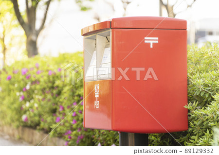Red mailbox refreshing morning 89129332