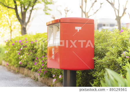 Red mailbox refreshing morning 89129361