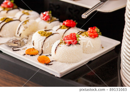 Dessert table in a Turkish hotel. Various cakes and sweets on buffet 89131083