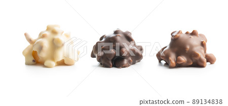 Chocolate truffles. Sweer pralines isolated on white background. 89134838