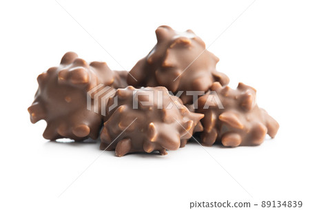 Chocolate truffles. Sweer pralines isolated on white background. Chocolate truffles. Sweer pralines isolated on white background. 89134839