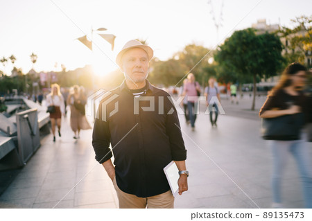 Caucasian blogger holding blank touch pad and thinking about getaway journey on vacations Caucasian blogger holding blank touch pad and thinking about getaway journey on vacations 89135473