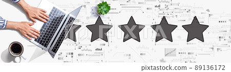 Rating star concept with person using a laptop 89136172