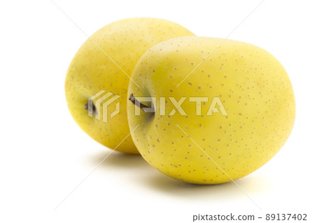 Yellow apple Orin white background 89137402