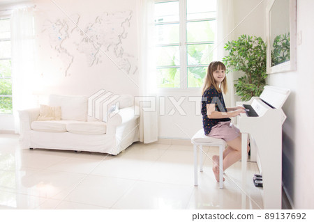 Child playing piano. Kids play music. Child playing piano. Kids play music. 89137692