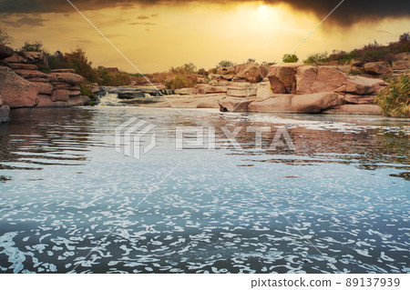 Beautiful mountain river flowing over rocks. Flow of water in mountain river close up 89137939