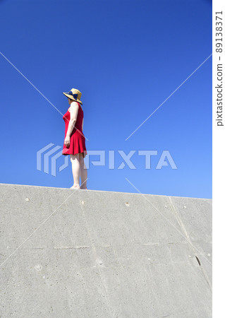 Taking a portrait of a woman in a straw hat at Sawara Fishing Port in Mori Town, Hokkaido Taking a portrait of a woman in a straw hat at Sawara Fishing Port in Mori Town, Hokkaido 89138371