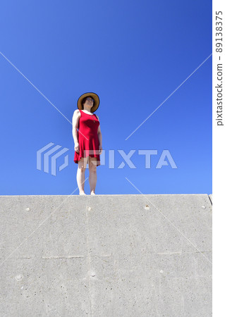 Taking a portrait of a woman in a straw hat at Sawara Fishing Port in Mori Town, Hokkaido Taking a portrait of a woman in a straw hat at Sawara Fishing Port in Mori Town, Hokkaido 89138375