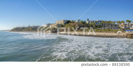 Beach at San Clemente with tourists and buildings near the shoreline in Orange County, California 89138500
